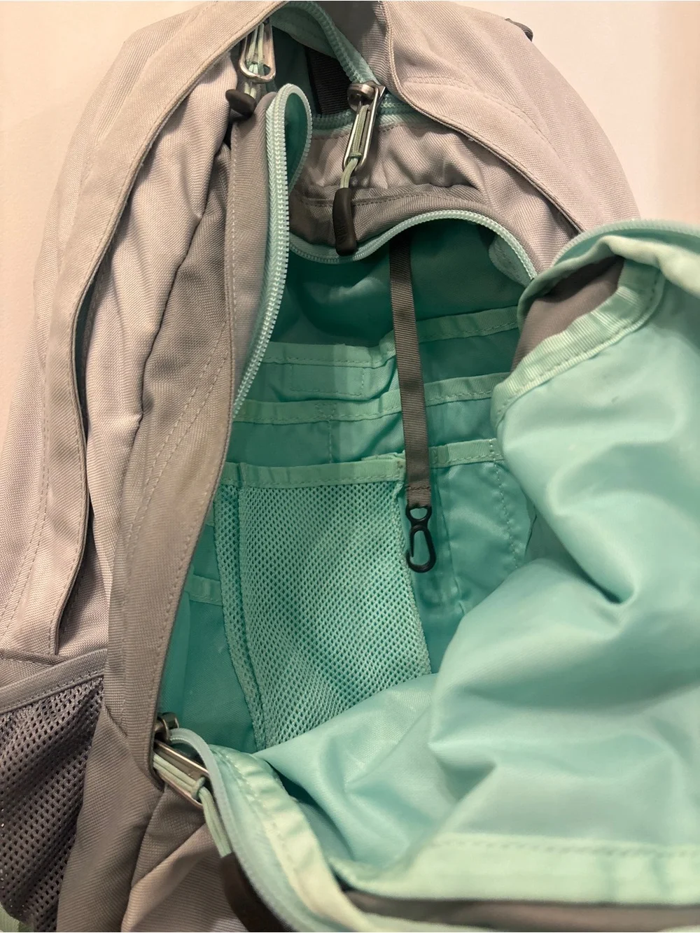 The North Face Backpack in Light Gray with Mint Accents